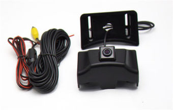 Камера переднего вида LC150 (под эмблемой решетки радиатора)