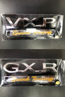VX-R и GX-R Grand Touring эмблема